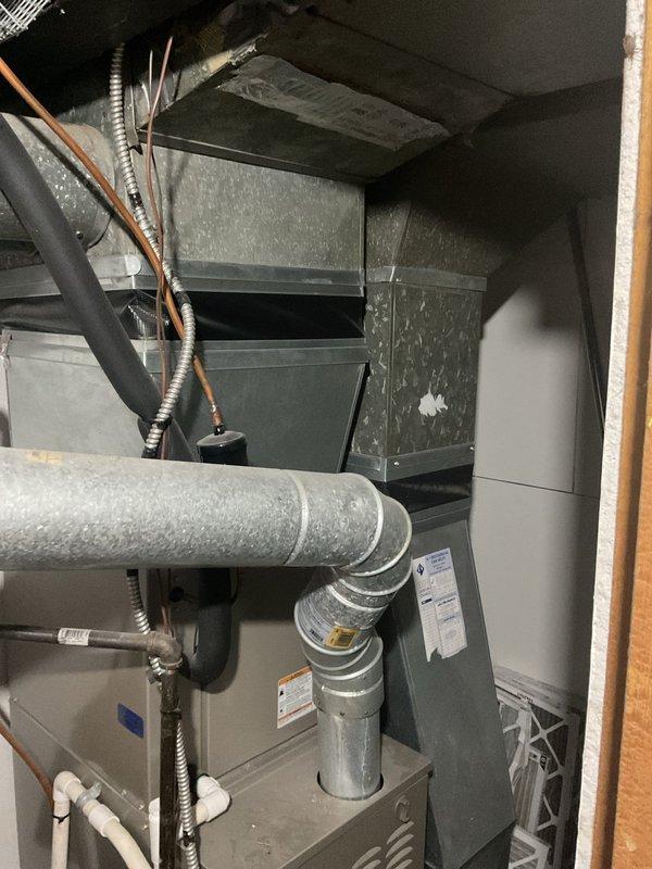Performed annual heating tune-up on furnace system without humidifier. Inspected galvanized metal housing, ductwork connections, and electrical components; all found to be in proper working condition. System is approximately 10 years old with typical wear but no operational issues identified.