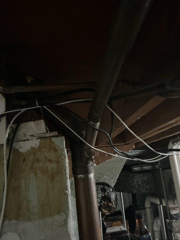 Inspected property regarding client-reported drain leak behind kitchen cabinets. Visual assessment revealed copper supply lines with significant oxidation and corrosion in basement/crawlspace area, along with drainage issues. Provided estimate for drain repair services and complete dishwasher installation including necessary plumbing connections as requested.