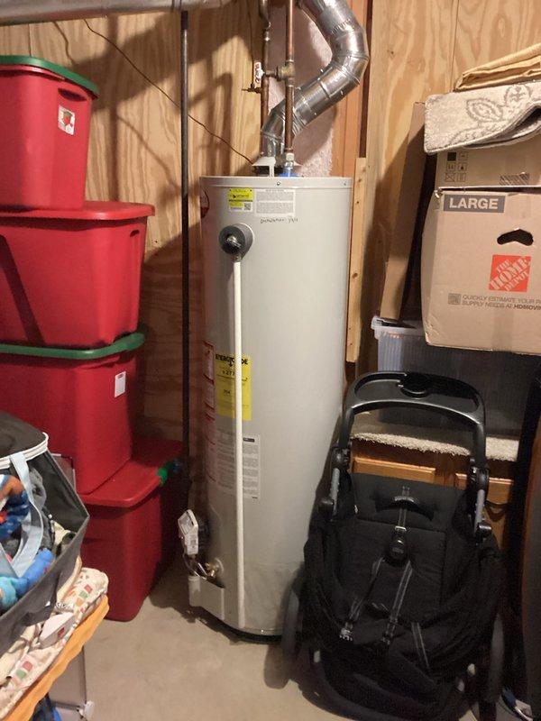 Inspected two toilets with slow flushing issues and confirmed the recently installed bidets were restricting water flow. Examined basement water heater and associated plumbing connections - all components in good working condition with proper ventilation and no visible leaks. Recommended caulking around basement tub to prevent water damage.