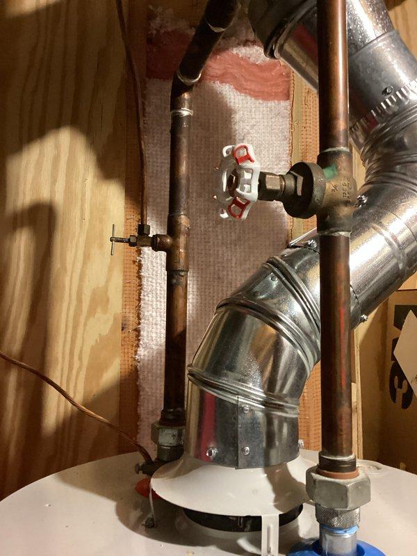 Inspected two toilets with slow flushing issues and confirmed the recently installed bidets were restricting water flow. Examined basement water heater and associated plumbing connections - all components in good working condition with proper ventilation and no visible leaks. Recommended caulking around basement tub to prevent water damage.