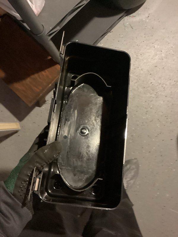 Performed annual furnace tune-up for Comfort Club member. Discovered water accumulation in condensate collection pan; cleaned and inspected the drain system to ensure proper drainage. System is an EnergiAir WT 11-2034 with humidifier, approximately 1 year old and now functioning correctly.