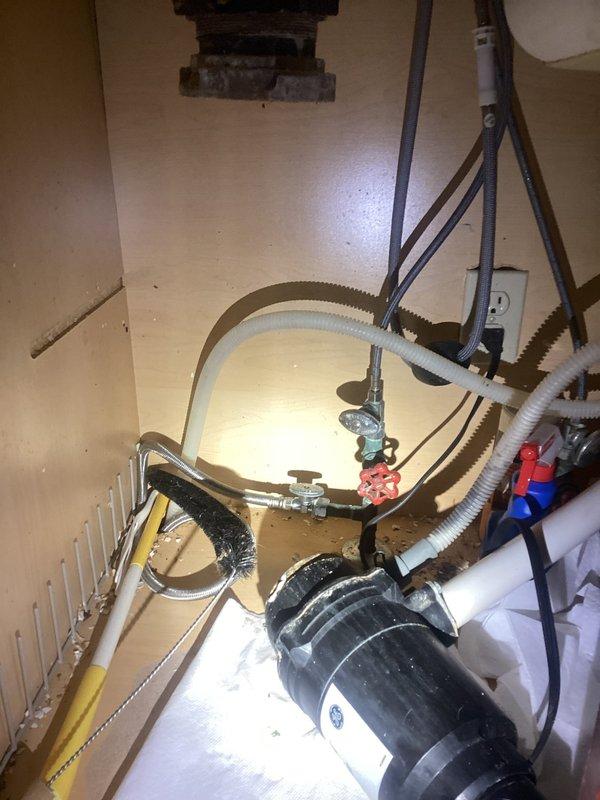 Responded to service call for a detached garbage disposal and compromised sink drain. Diagnosed failure in mounting assembly and drain pipe connection. Successfully reinstalled garbage disposal unit with new hardware, reconnected all plumbing components, and verified proper operation of both disposal and left sink basin drainage.