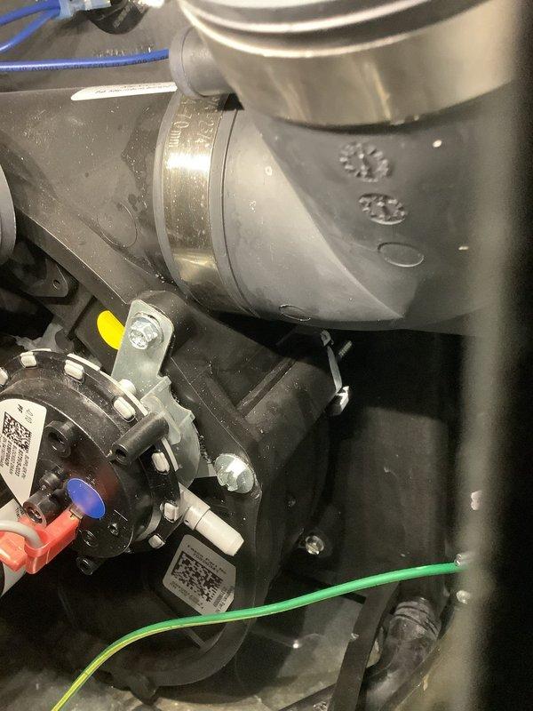 Responded to no-heat call for 3-year-old EnergiAir furnace. Diagnosed water accumulation in condensate pan and red fault light on sensor. Inspected system components, cleared drain line, and reset system to restore proper operation. Unit is now functioning within normal parameters.