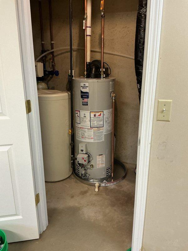 Successfully installed a new 40-gallon natural gas water heater (PV NG 6/6) in utility closet. Connected all required copper and PVC piping to existing plumbing system, ensuring proper ventilation. Unit was tested and confirmed to be functioning correctly with no leaks.