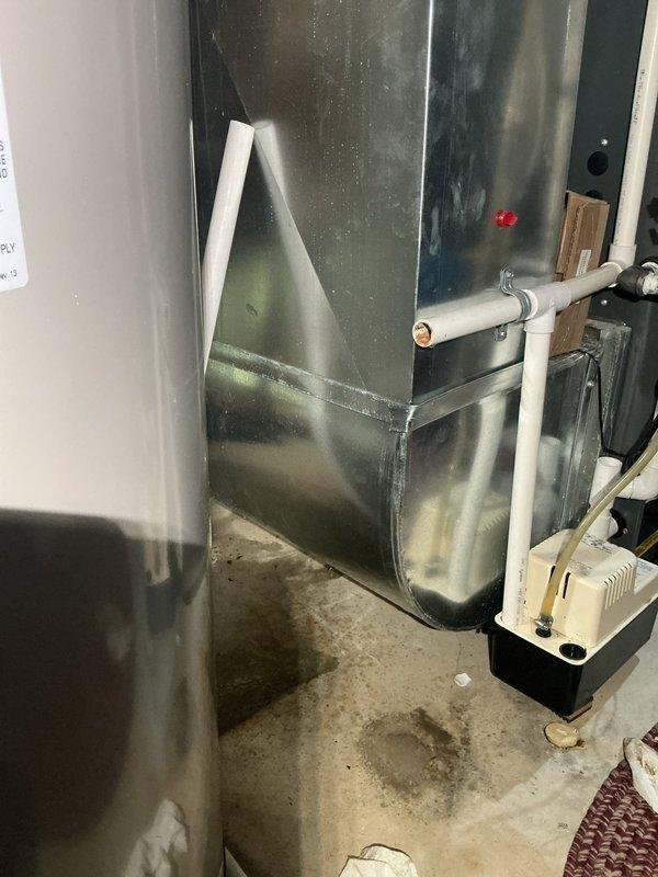 Completed annual furnace tune-up for Comfort Club member with EnergiAir WT 05-2032 unit (installed 3 years ago). Inspection revealed significant corrosion around heat exchanger opening, indicating possible moisture exposure or condensation issues. Documented condition with photos and recommended monitoring for potential future replacement.