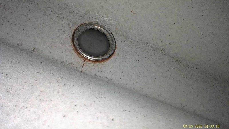 Performed annual heating maintenance on 16-year-old furnace. Observed significant rust formation around drain components and corrosion on metal surfaces. System requires further evaluation due to age and visible deterioration.