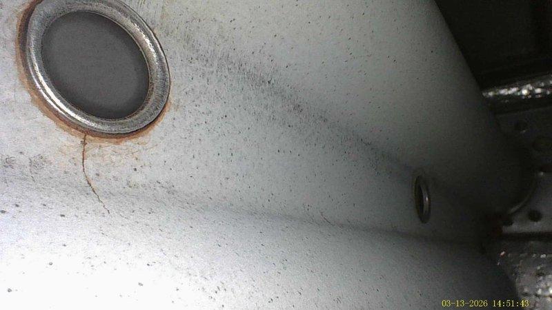 Performed annual heating maintenance on 16-year-old furnace. Observed significant rust formation around drain components and corrosion on metal surfaces. System requires further evaluation due to age and visible deterioration.