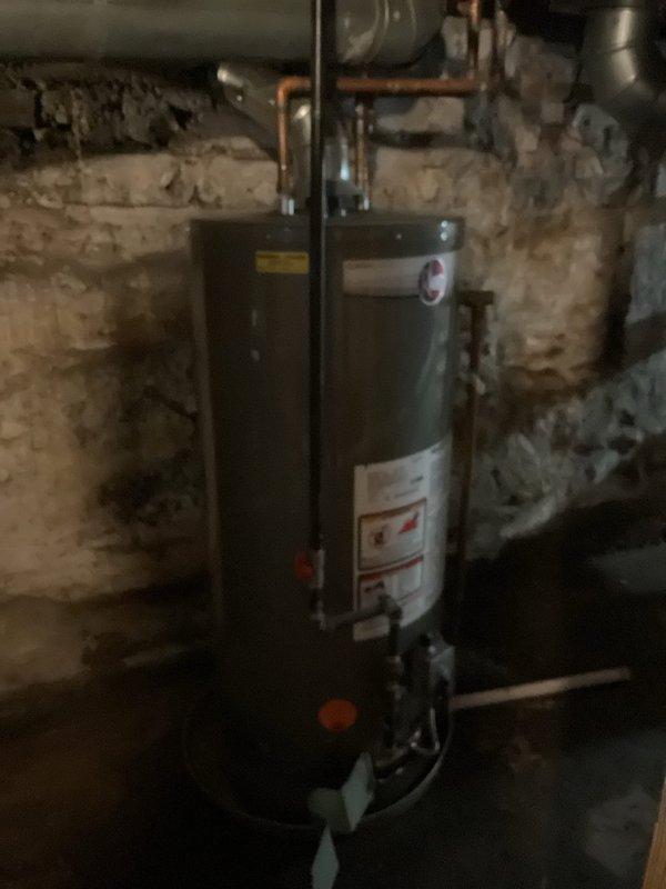 Responded to no hot water call for 10-year-old Rheem water heater that would not light. Upon inspection, diagnosed ignition system failure and performed necessary repairs to restore proper operation. Confirmed water heater functioning correctly with hot water production before completing service.