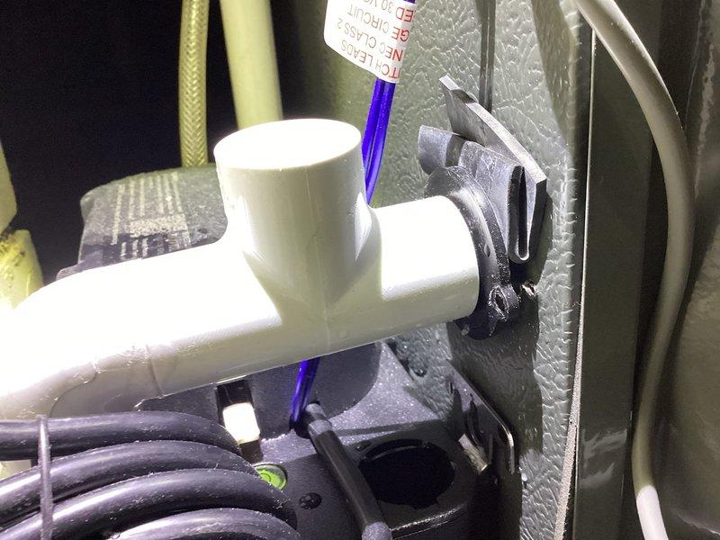 Responded to no-heat call for furnace not turning on. Inspected condensate drainage system and found blocked T-junction in the PVC condensate line causing safety switch activation. Cleared obstruction, verified proper drainage, and restored system operation.