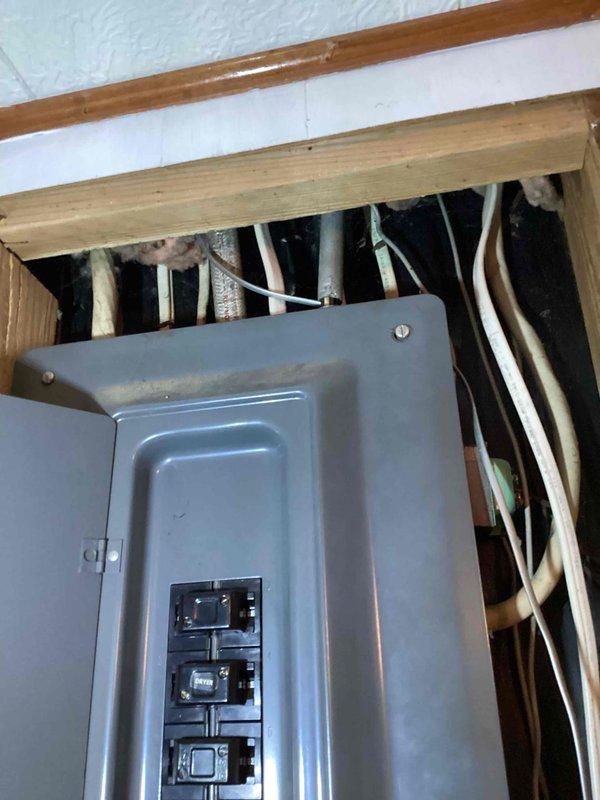 Responded to no-heat service call for 10+ year old furnace exhibiting blinking red light (6-flash code). Performed diagnostic inspection including evaluation of electrical components, capturing documentation of exterior utility connections and interior electrical panel with circuit breakers. Completed system tune-up to restore proper heating operation.