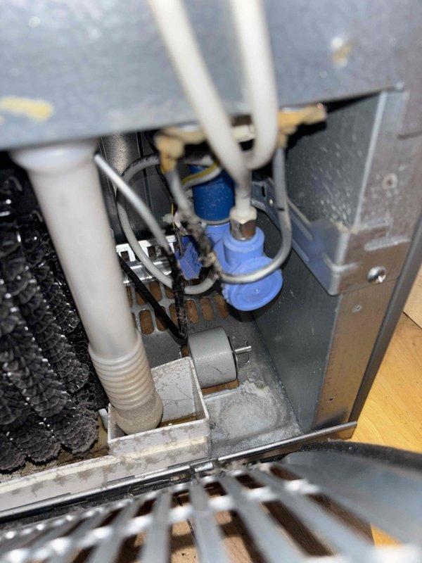 Responded to service call for ice maker malfunction following previous plumbing work. Inspected refrigerator water supply line and connection valve, finding the blue inlet valve had not been properly opened after the earlier service. Restored water flow to the ice maker by correctly positioning the valve and verified proper operation before completing the service.