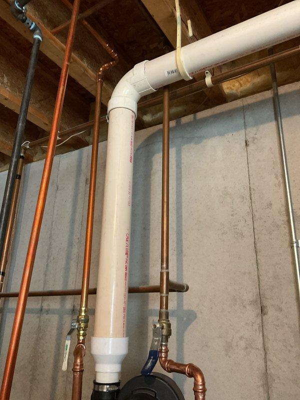 Successfully installed a Bradford White 75-gallon natural gas water heater with power vent and 10-year warranty. Completed all necessary copper and PVC piping connections, installed circulation pump on top of the tank, and verified proper function of the pressure relief valve. System was tested and confirmed to be operating correctly with no leaks.