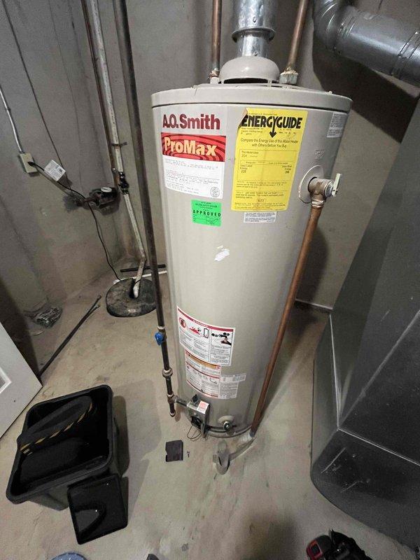 Responded to service call for water heater with pilot light failure issue. Diagnosed 15+ year old A.O. Smith ProMax unit with thermocouple malfunction preventing pilot light from staying lit. Replaced thermocouple assembly, verified proper ignition sequence, and confirmed stable pilot flame with normal operation restored.