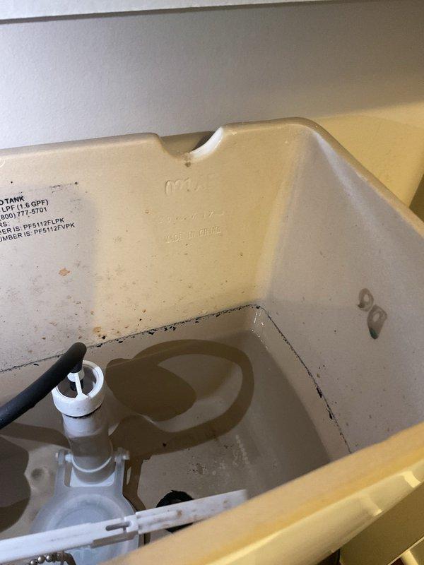 Responded to service call for toilet with continuous running water and handle operation issues. Upon inspection, adjusted flush valve assembly and flapper to correct water running problem. Repaired handle linkage mechanism to eliminate need to hold handle down during flush cycle. Tested operation multiple times to ensure proper function and water shutoff.