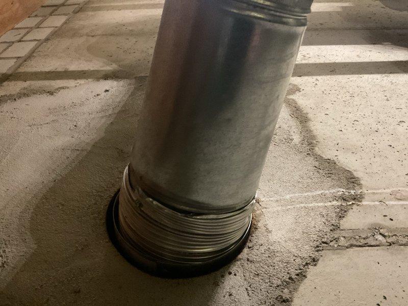Performed annual heating tune-up, inspecting water heater installation including proper connection of copper pipes, ventilation ducting, and safety valve. Confirmed proper installation of metal duct through concrete floor with appropriate flashing and seal at the base. System is functioning within normal parameters.