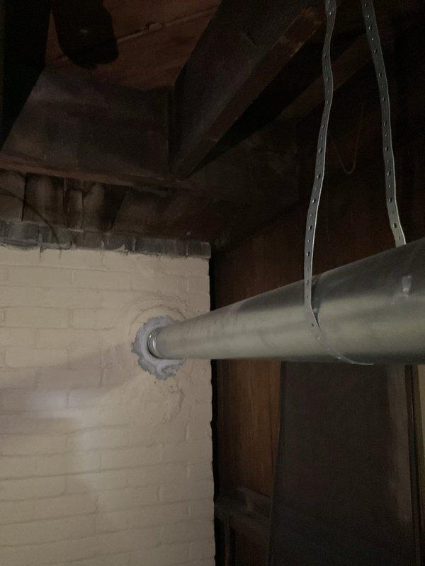 Responded to service call for 13-year-old Bradford White water heater not producing hot water. Diagnosed and relit extinguished pilot light, verified proper operation of gas valve and thermocouple. System now functioning correctly with consistent flame pattern and adequate hot water production.