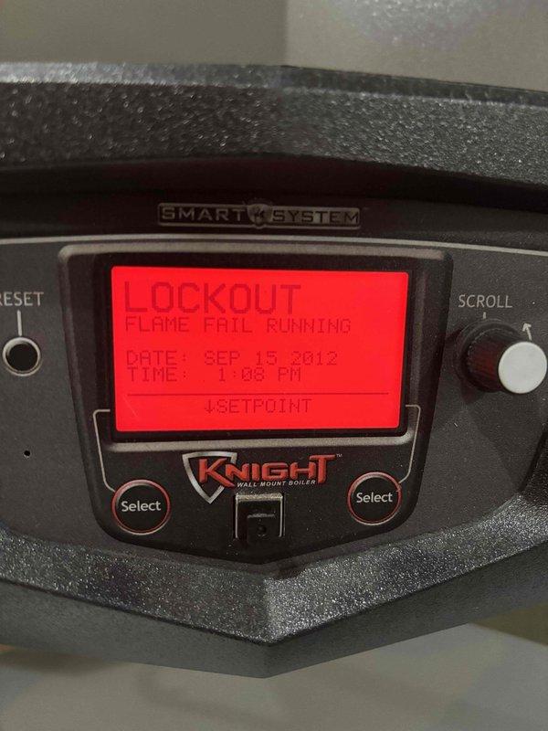 Responded to service call for 11-year-old Lochinvar boiler making wooshing noise. Performed inspection using endoscope camera to examine internal components, revealing corrosion and deterioration in copper piping. Diagnostic testing identified system in lockout mode with "FLAME FAIL RUNNING" error displayed on Knight control panel, indicating combustion issues affecting proper operation.