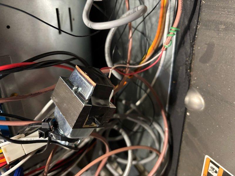 Completed annual furnace and humidifier tune-up service per scheduled maintenance plan. Inspected electrical components and wiring connections in control panel, verifying proper transformer operation and secure wire terminations. All systems functioning normally with no issues detected.