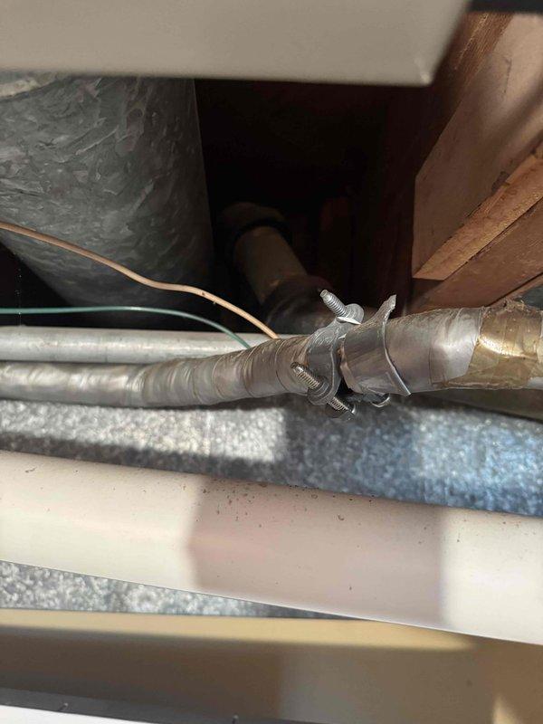 Repaired shower faucet leak by replacing worn R110 BP TYPE P cartridge. Accessed plumbing through wall panel, inspected valve assembly and connections, then installed new cartridge with proper sealing to eliminate water leakage. Tested operation to verify complete resolution of the issue.