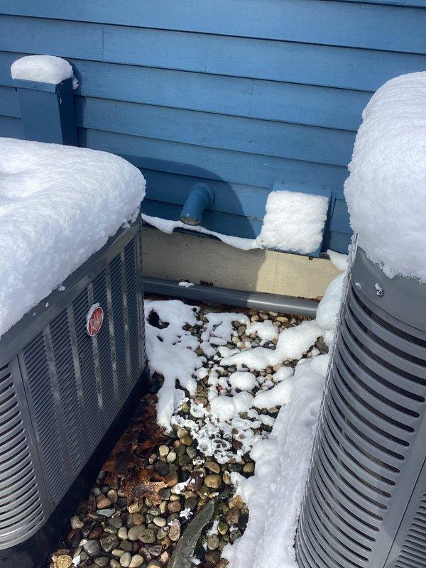 Diagnosed water heater exhibiting no hot water production. Inspection revealed proper gas ignition with strong blue flame pattern visible through viewing window. Confirmed unit is operational with normal combustion; instructed customer on correct thermostat settings to restore hot water function.