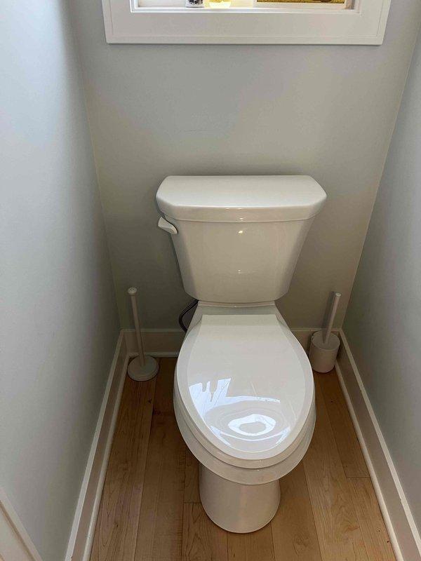 Successfully installed three Gerber toilets as quoted, replacing old units that showed significant wear and water damage around the flanges. New installations were properly secured to the floor flanges with the appropriate hardware, ensuring proper seal and functionality.
