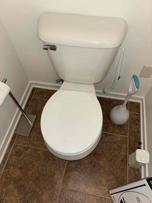 Responded to plumbing leak service call. Repaired corroded sink drain assembly with significant mineral buildup that was causing leakage under faucet. Additionally, installed customer-provided toilet seat replacement as requested.