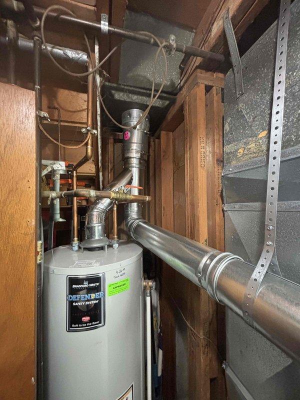 Successfully completed installation of Carrier furnace system with proper venting and ductwork connections. System was verified to be functioning correctly with all required safety features in place. All old equipment was removed and the new installation meets current code requirements.