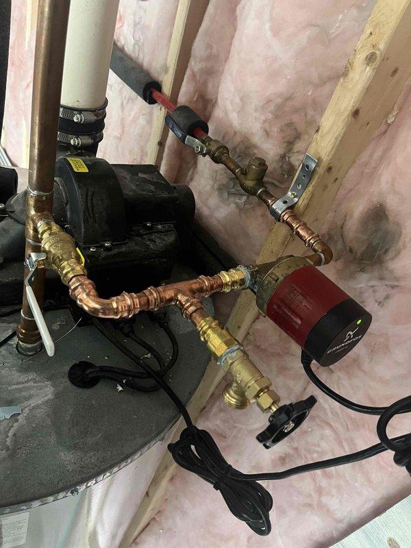 Successfully completed quoted repair of water heater pipe leak. Installed new copper piping with brass fittings and valves to resolve the issue, and reconnected the circulation pump to restore proper system function. All connections were tested and confirmed leak-free.