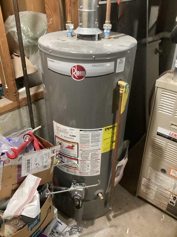 Responded to no heat complaint for a Lennox furnace system. Diagnosed issue and restored heat functionality. System is now operating properly with normal airflow through ductwork and proper connection to the adjacent Rheem Professional water heater.