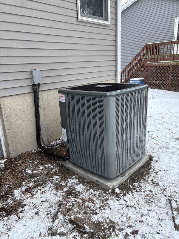 Successfully completed installation of new residential HVAC system, including outdoor condenser unit mounted on concrete pad with proper electrical connections and a new indoor air handler/furnace unit with associated ductwork and PVC condensate drainage system. All components were properly installed according to manufacturer specifications and tested for optimal performance.