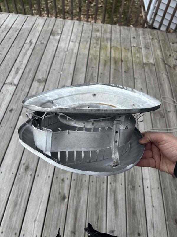 Replaced damaged vent caps on both water heater and furnace ventilation systems located on the roof of two-story residence. Existing caps showed significant wear and bent components that were compromising proper ventilation function. Installed new caps to restore proper exhaust flow and prevent weather/debris infiltration.