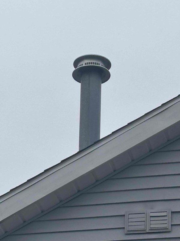 Replaced damaged vent caps on both water heater and furnace ventilation systems located on the roof of two-story residence. Existing caps showed significant wear and bent components that were compromising proper ventilation function. Installed new caps to restore proper exhaust flow and prevent weather/debris infiltration.