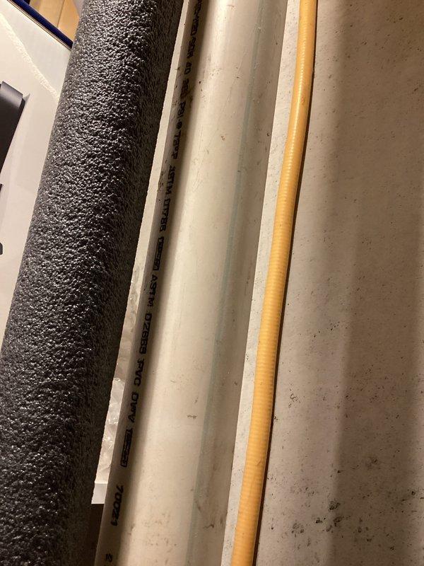 Responded to emergency service call for a leaking 18-year-old Bradford water heater. Upon inspection, confirmed active leak from tank with water being collected in container below valve. Completed diagnostic assessment and provided customer with replacement options due to age of unit and tank failure.