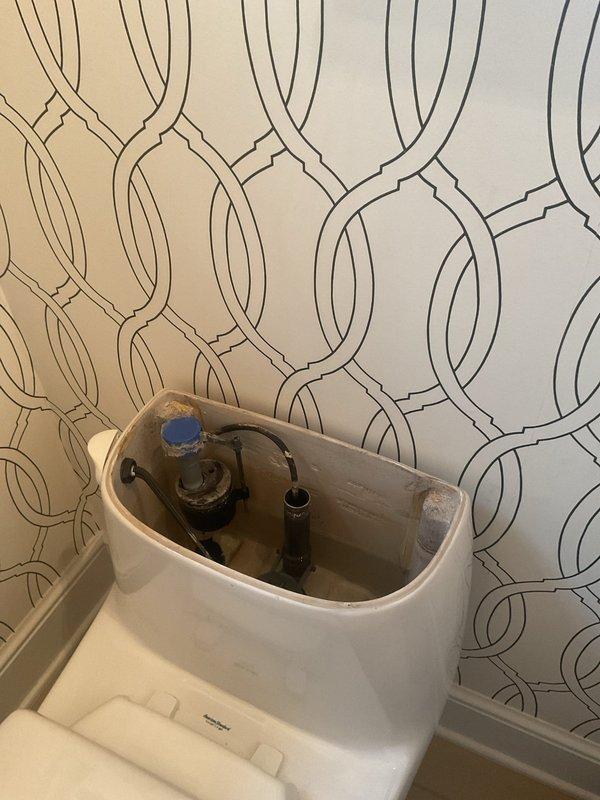 Diagnosed and repaired toilet with tank filling issue by replacing faulty fill valve assembly which was preventing proper water flow. Verified proper tank filling and flushing operation after installation of new component, restoring full functionality to 2011 model toilet.