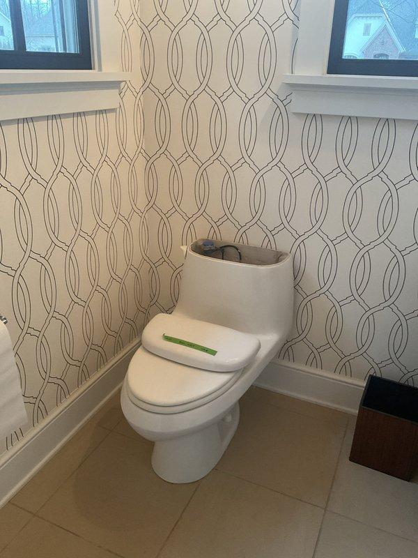 Diagnosed and repaired toilet with tank filling issue by replacing faulty fill valve assembly which was preventing proper water flow. Verified proper tank filling and flushing operation after installation of new component, restoring full functionality to 2011 model toilet.