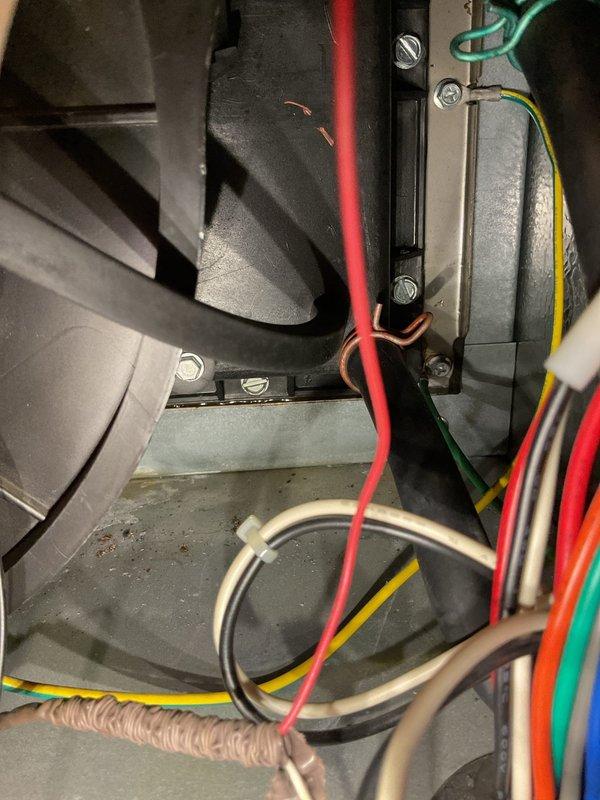 Performed annual heating maintenance on 16-year-old ENERGI furnace. Inspection revealed significant rust/corrosion on interior components and deteriorating insulation. Blower assembly and electrical connections appear to be in functional condition despite the unit's age.