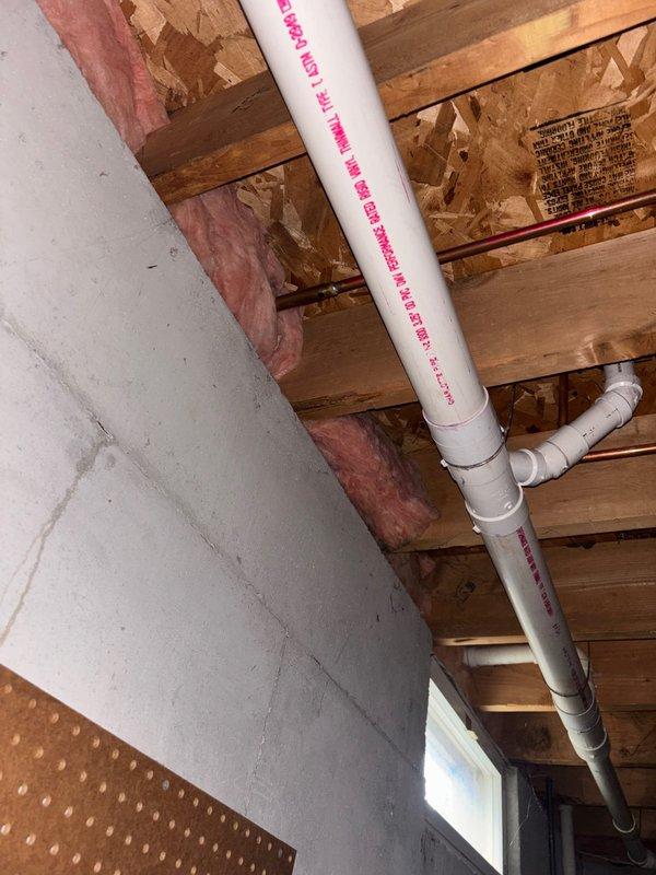 Successfully repaired exterior hose bib that had been leaking due to freeze damage from winter exposure with attached hose. Inspected interior PVC supply line connections in basement to ensure proper operation and no additional leaks.