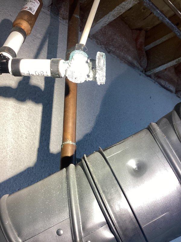 Responded to service call for water heater with recurring pilot light failure. Inspection revealed significant mineral deposits around valve connections and copper/PVC pipe junctions. Cleaned affected components and restored proper gas flow to maintain consistent pilot flame operation.