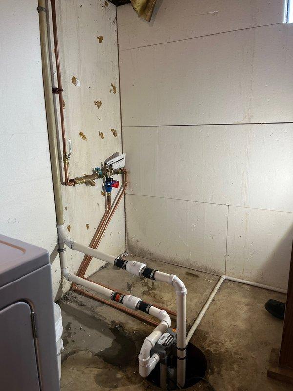 Completed QUOTR-Quoted Repair involving installation of new water jet backup system in basement utility area. Installed PVC drainage configuration with proper connections to existing plumbing, and positioned sump pump system in concrete floor pit with necessary electrical connections. System was tested for proper functionality to ensure effective water management during backups, completing the 5-hour CWOW service.