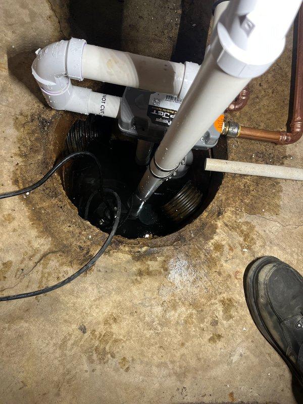Completed QUOTR-Quoted Repair involving installation of new water jet backup system in basement utility area. Installed PVC drainage configuration with proper connections to existing plumbing, and positioned sump pump system in concrete floor pit with necessary electrical connections. System was tested for proper functionality to ensure effective water management during backups, completing the 5-hour CWOW service.