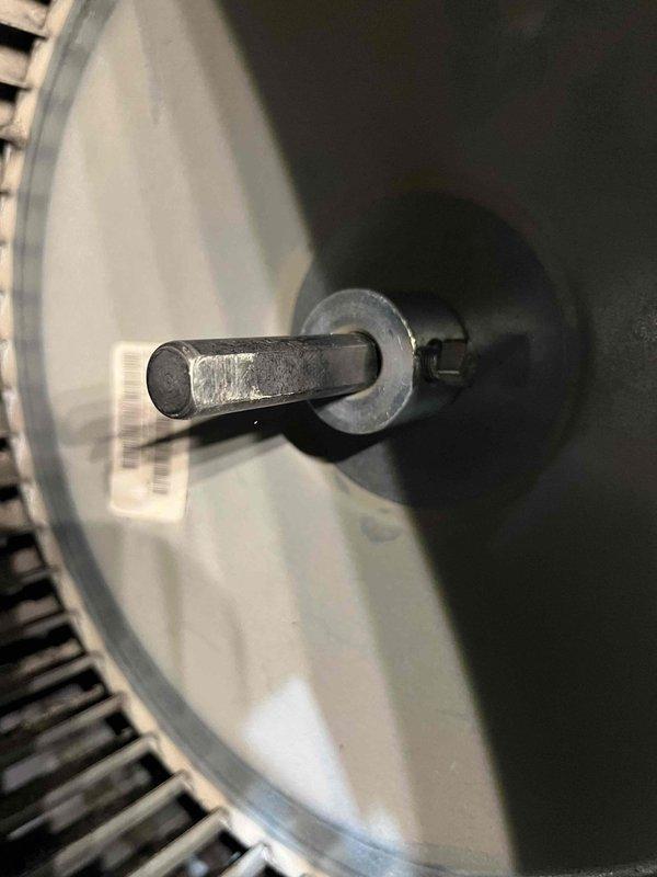 Performed annual heating maintenance on 23-year-old Rheem furnace. Inspected and cleaned blower wheel which showed moderate dust accumulation. Checked and adjusted mechanical components including the drive shaft assembly. System operating properly with no humidifier present.