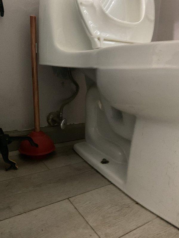 Responded to service call for toilet actively backing up. Upon inspection, found blockage in the waste line and cleared using plunger. Verified proper drainage and function after service with multiple test flushes.