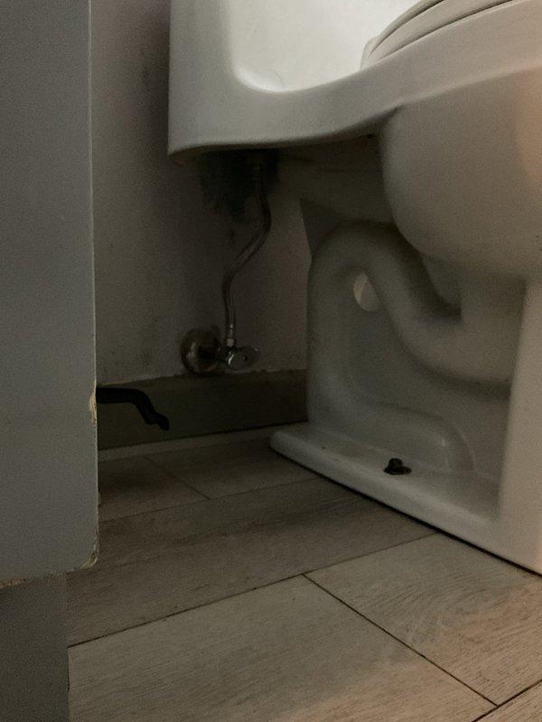 Responded to service call for toilet actively backing up. Upon inspection, found blockage in the waste line and cleared using plunger. Verified proper drainage and function after service with multiple test flushes.