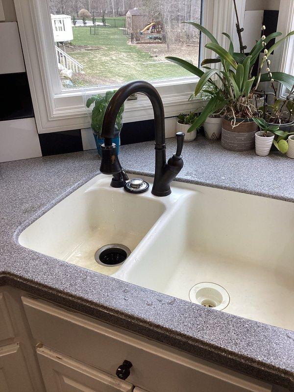 Diagnosed and repaired a leaking bathtub faucet in master bathroom, replacing worn cartridge and valve components to eliminate dripping. Also serviced kitchen sink faucet, cleaning aerator and tightening loose mounting hardware to restore proper function and water flow.