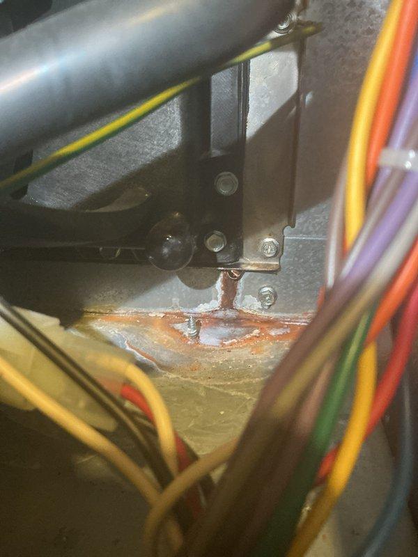 Performed annual heating tune-up on 12-year-old ENE system per club membership. Inspected electrical connections and identified corrosion on terminal connections. Cleaned corroded contacts and verified proper grounding of control board to ensure safe operation.