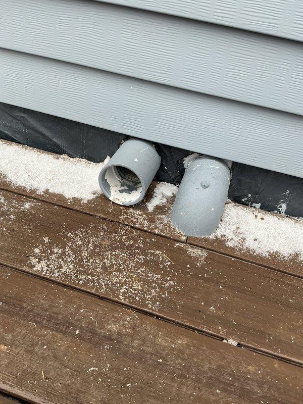 Inspected exterior vent pipe configuration where two PVC pipes currently protrude through the siding at deck level. Evaluated options for relocating HVAC ventilation to accommodate client's deck renovation project. Documented current installation with photographs to develop proper venting solution that will maintain code compliance while allowing for new deck construction.