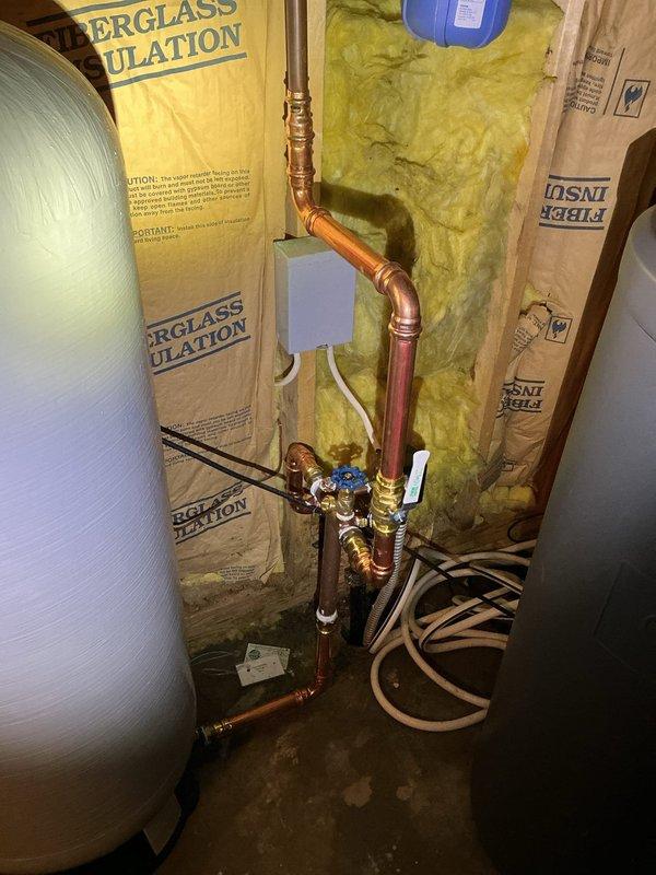 Conducted initial assessment of pressure tank system in utility area. Identified pressure tank requiring replacement. Completed temporary repairs to copper plumbing lines and valves in mechanical room. Will return to complete pressure tank replacement, estimated 4-hour job.