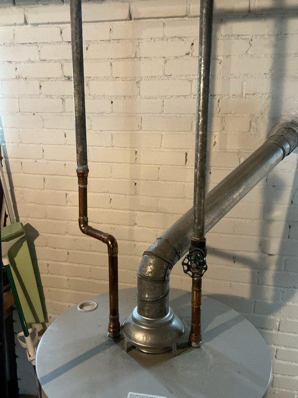 Diagnosed intermittent pilot light failure on 8-year-old Bradford White Defender water heater. Cleaned thermocouple and pilot assembly, adjusted gas pressure to manufacturer specifications, and verified proper venting. System now maintaining stable pilot flame with consistent heating performance.