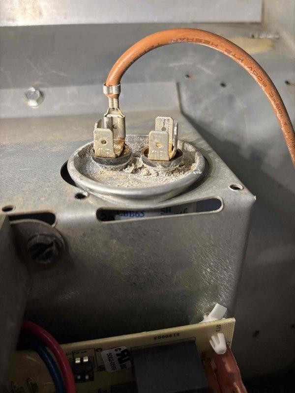 Responded to no heat/no hot water call for 1-year-old Lochinvar furnace and 11-year-old EnergiAir water heater. Discovered corroded electrical terminals with dust accumulation on the heat circuit, affecting system operation. Inspected and serviced control board components, addressing connection issues that were preventing proper heating function.