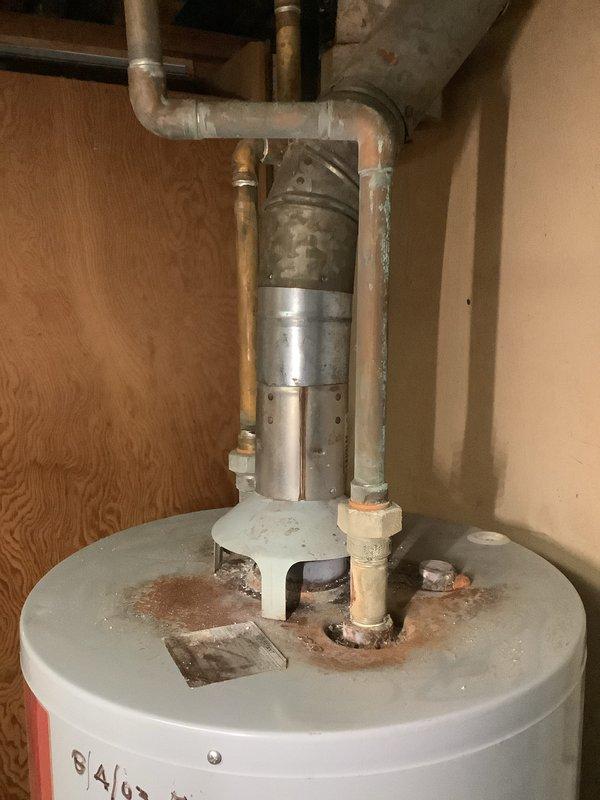Conducted comprehensive assessment of existing water heater system showing signs of age, including deterioration of insulation, pipe discoloration, and possible corrosion at connection points. Evaluated feasibility of converting current gas range to electric, documenting necessary plumbing and electrical requirements for both projects. Provided detailed estimate for water heater replacement and conversion options based on inspection findings.